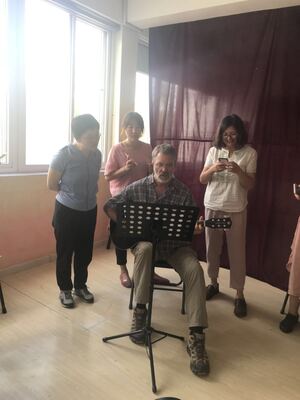 Qingdao aizhifan working with teachers2
