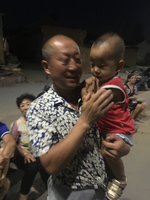 Beijing grandfather with migrant worker orphan