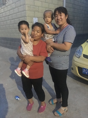 Beijing grandmothers with orphans