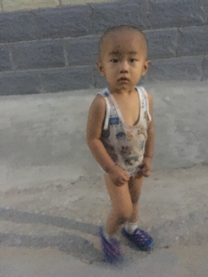 Beijing village migrant workers orphan boy