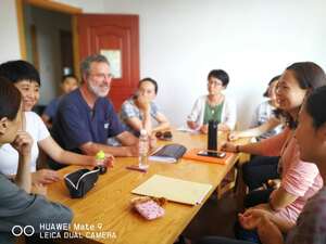 Qingdao ming zur yuan discussions wth teachers